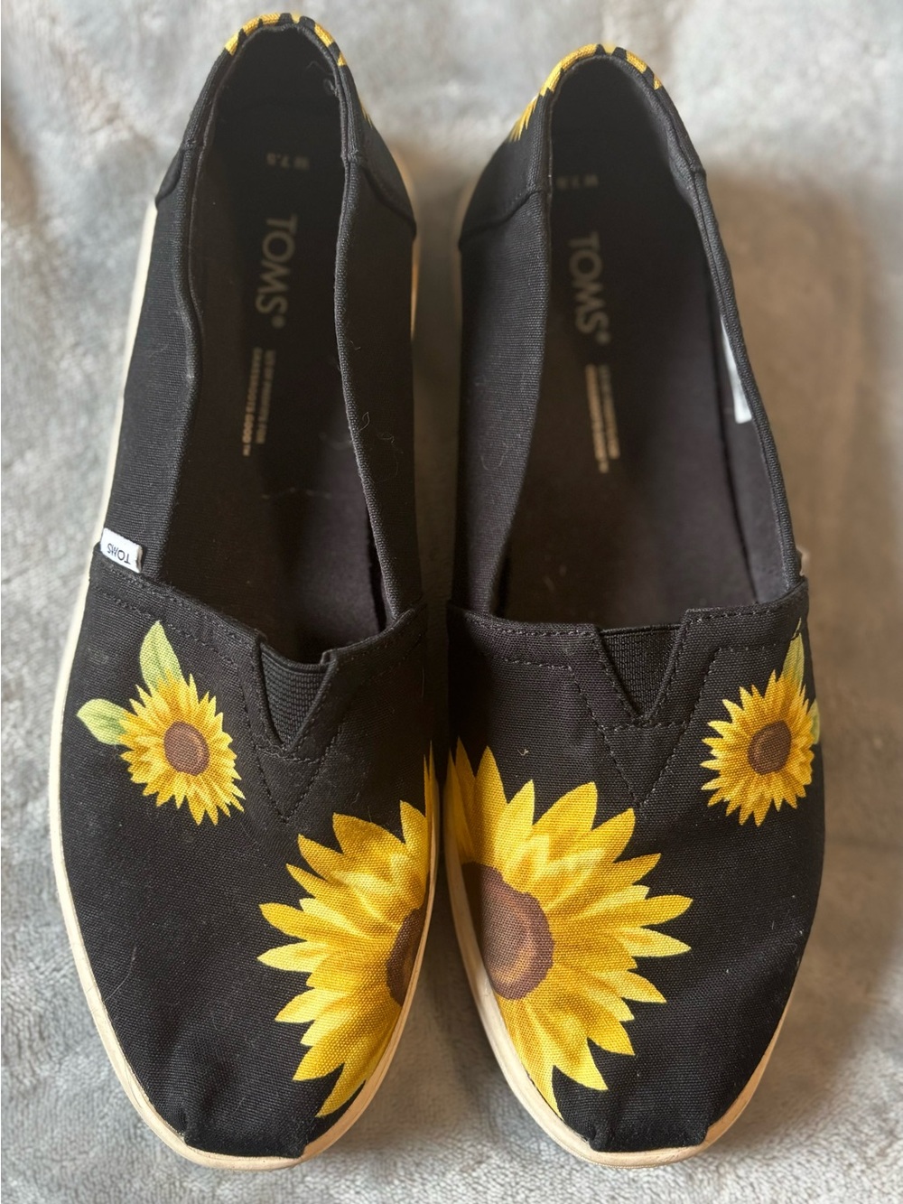 Toms Black Canvas Slip-Ons with Yellow Sunflower Print